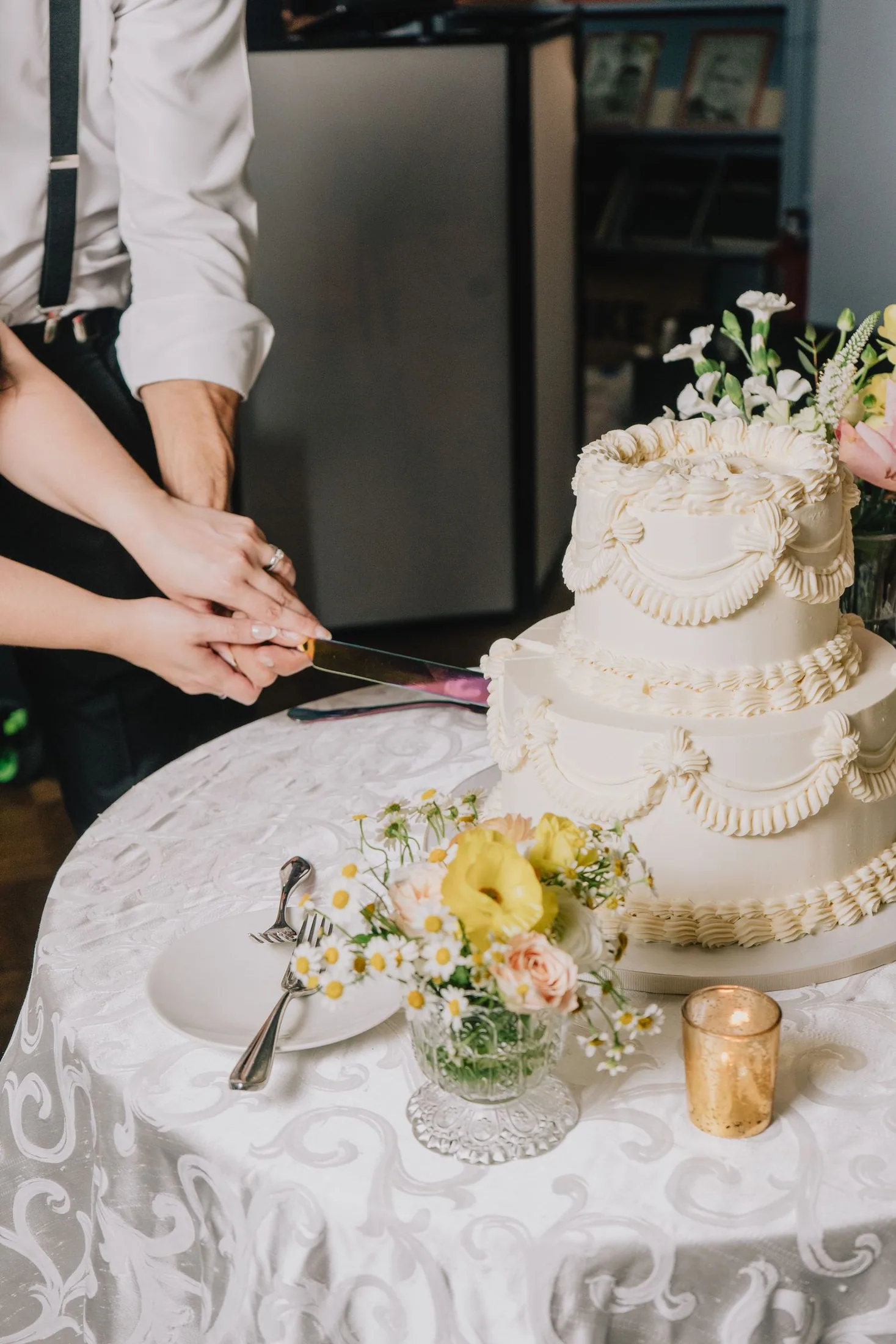 Wedding cake and floral reception details